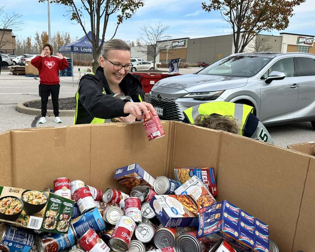 Volunteer sorting donated food